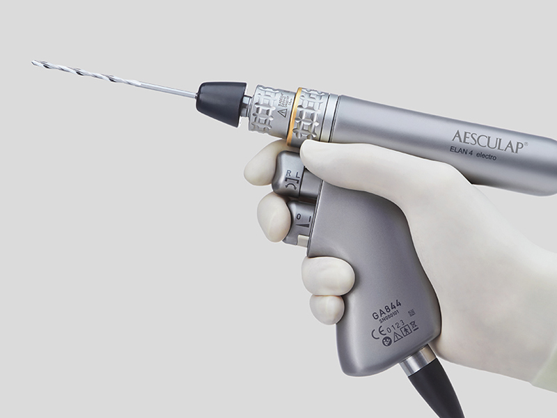 Surgical power system held by one hand with glove